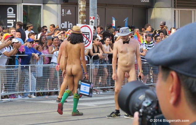 Jade Sambrook doing the 'slide-glide' while walking naked in the Toronto World Pride Parade.